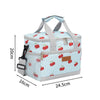 Light blue insulated lunch bag with a checkered pattern and red apple graphics, featuring padded handles.