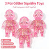 A set of three pink transparent glitter squishy toys for stress relief and fidgeting