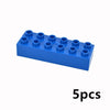 A blue plastic building block set with ten cylindrical pieces arranged in a row.