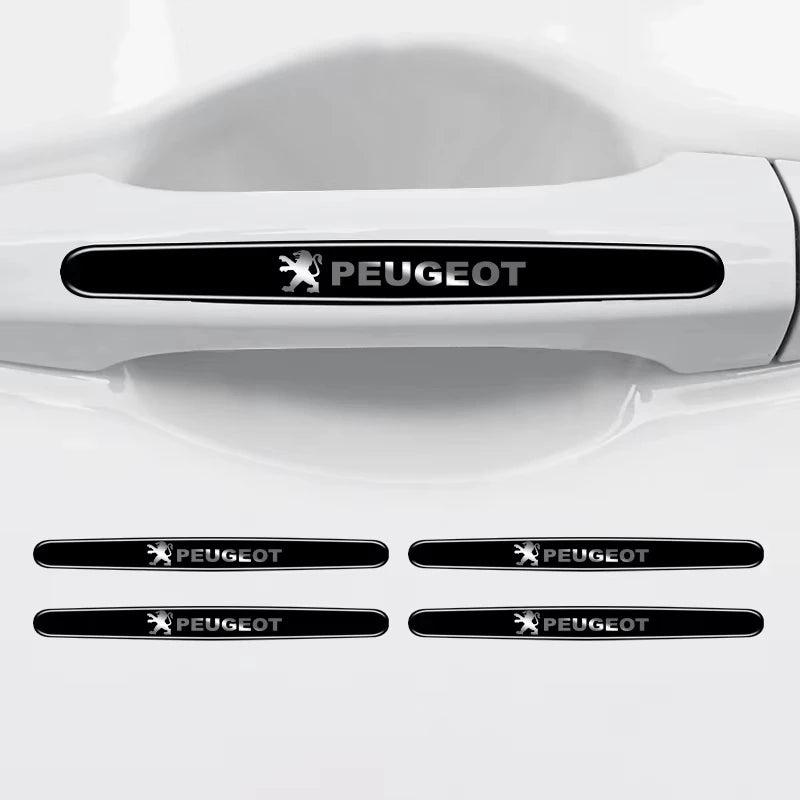 Black anti-scratch film stickers applied to the interior surface of a car door handle bowl.