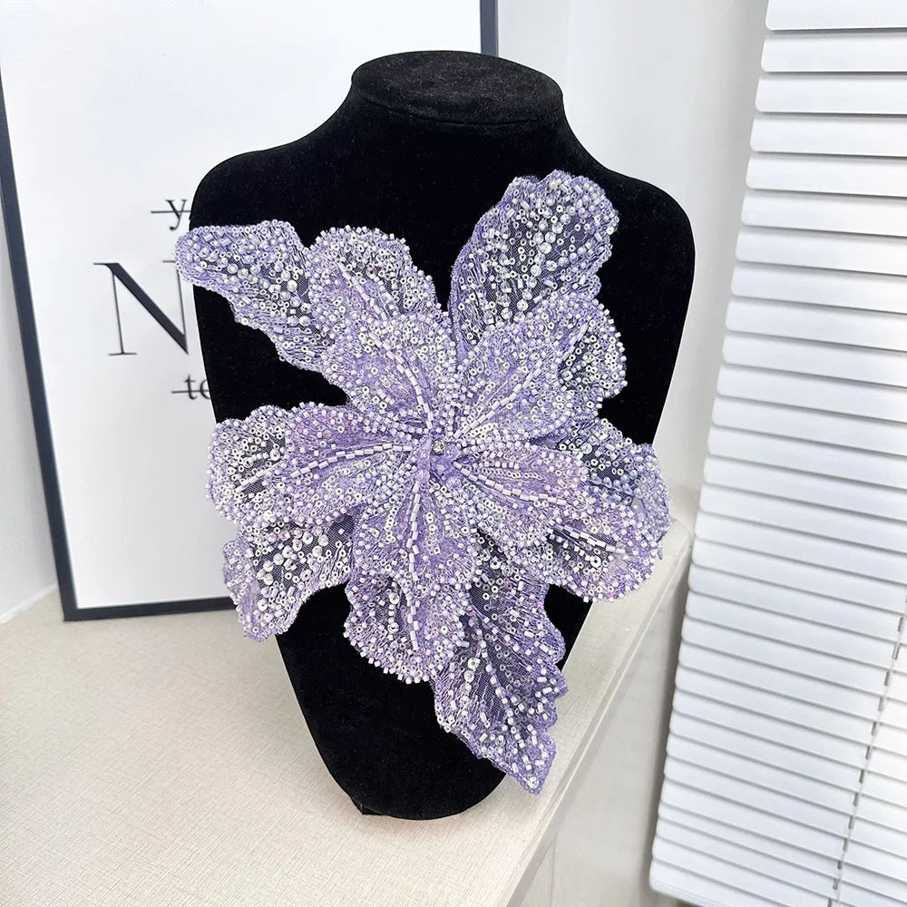 Purple sequin floral lace applique patch for sewing and DIY crafts displayed on a black mannequin.