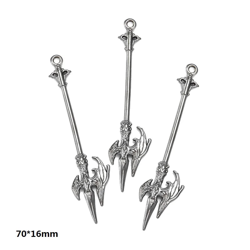 A set of 16 gun-shaped charms for DIY jewelry making in silver metal.
