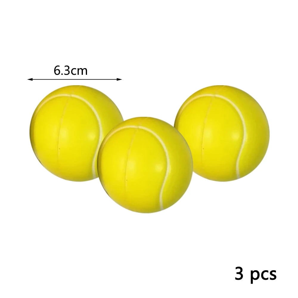 A set of three yellow soft foam sports stress balls shown with a dimension marker.