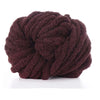 A ball of dark brown chunky acrylic yarn used for knitting and crochet