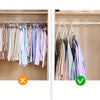A display of various colored shirts and blouses hanging on a multi-hole space-saving clothes hanger.