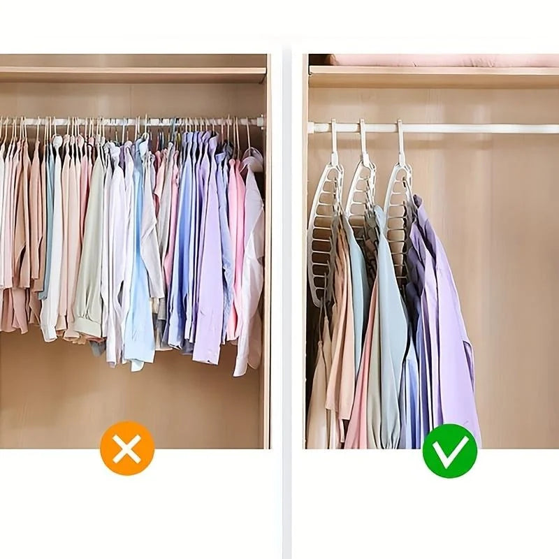 A display of various colored shirts and blouses hanging on a multi-hole space-saving clothes hanger.