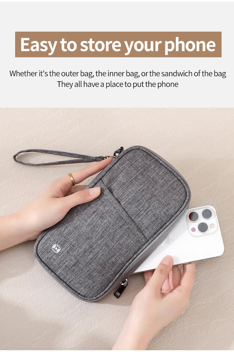 A gray RFID-blocking passport holder is shown being used to store a white smartphone.