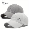 A set of two light gray and white quick dry baseball caps shown against a white background.