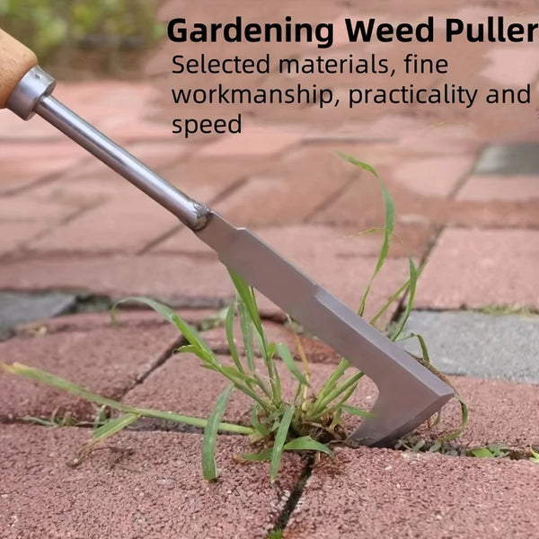 A stainless steel L-shaped gardening weed puller resting on a brick surface.