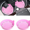Pink silicone car cup holder coasters with a textured surface and rhinestone trim