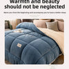 A deep blue quilted fleece blanket is shown on a bed, emphasizing warmth and beauty for better sleep.