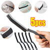 A set of five black crevice cleaning brushes and a cleaning tool are shown with various angles.