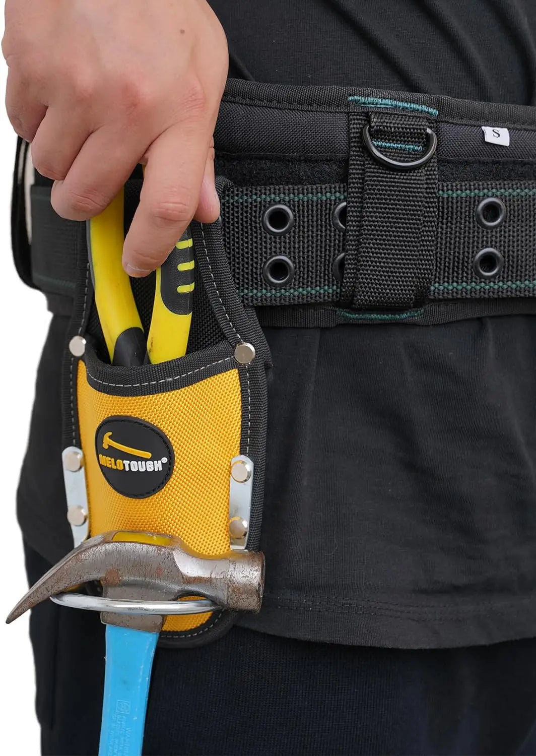 A hand is holding a yellow heavy-duty pliers tool with a hammer loop inside a black leather holster attached to a work belt.