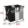 A foldable waterproof laundry basket with handles and sorting compartments shown in black, white, and gray.