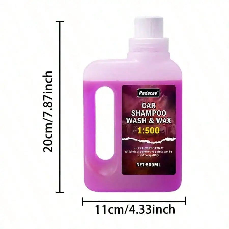 A bottle of pink foam car shampoo wash and wax with a white pump dispenser.