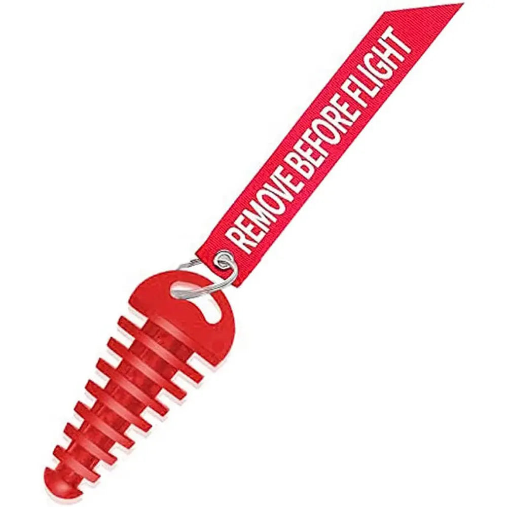 Red rubber exhaust wash plug with a keychain tag for motorcycles and dirt bikes