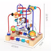 A wooden bead maze toy for toddlers featuring colorful beads on red and blue strings.