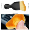 A close-up of an orange soft-bristle cleaning brush with a protective case being held by a hand.