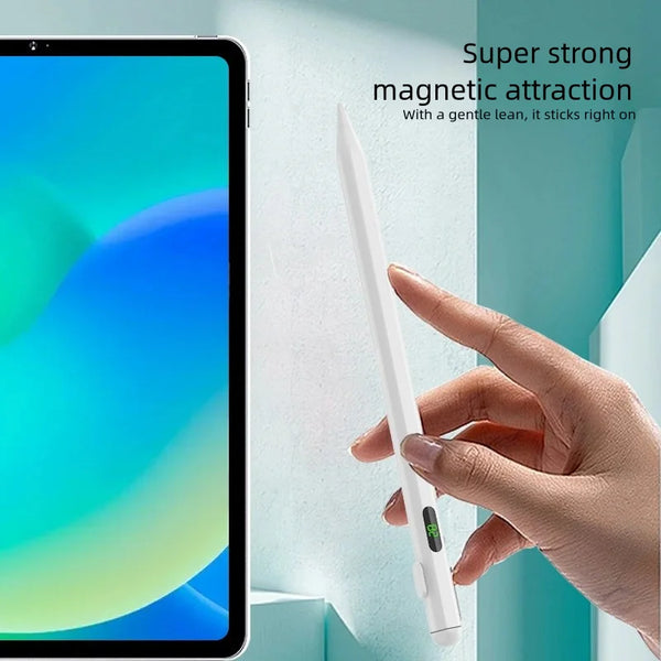 A hand is holding a white stylus pen against a light blue wall, demonstrating its magnetic attraction to a tablet screen.