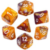 A collection of seven polyhedral dice in various colors and angles for role-playing games