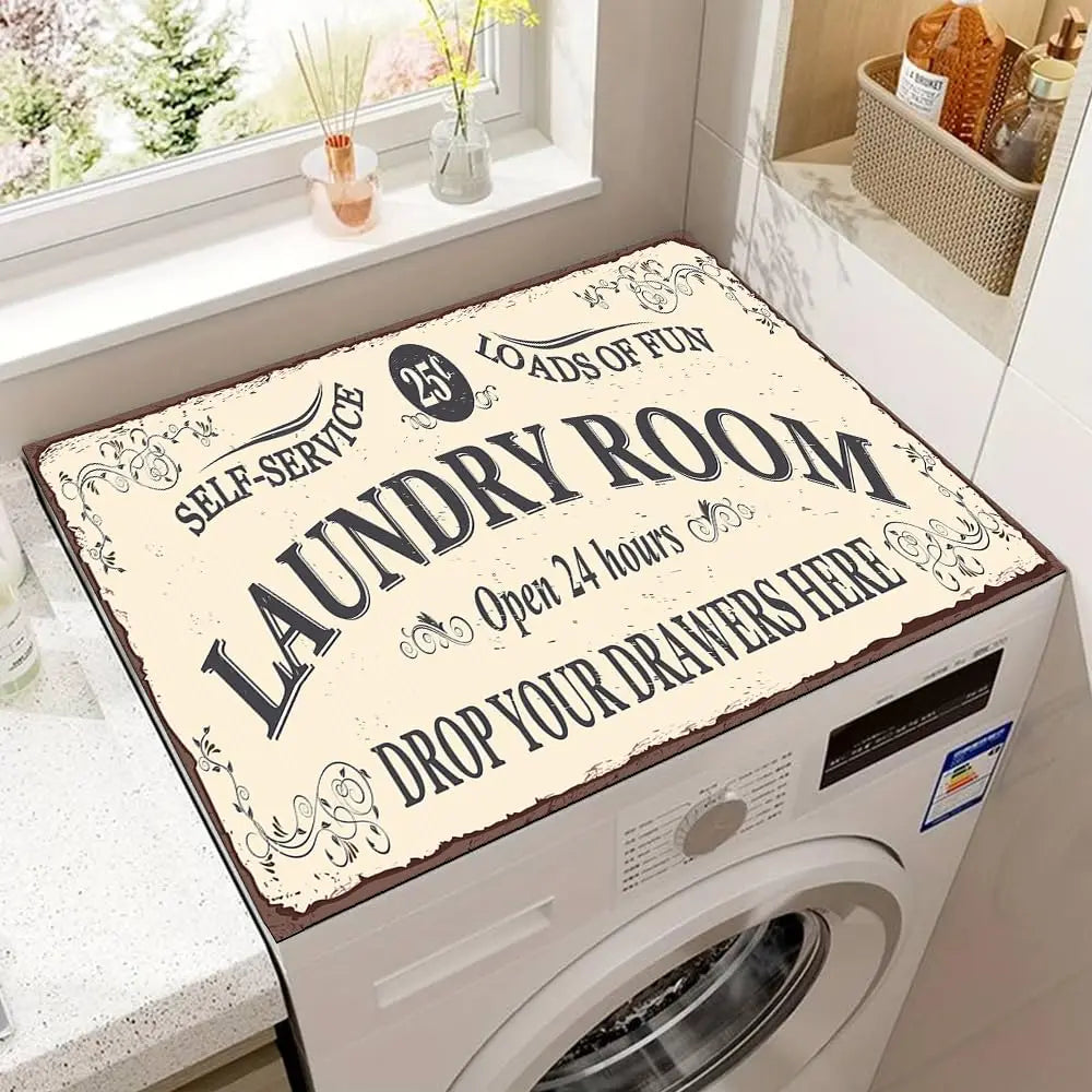 A laundry room featuring a white washing machine with a decorative mat on top, next to a window.
