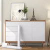A roll of self-adhesive wood grain wallpaper displayed on a wooden cabinet with decorative items.