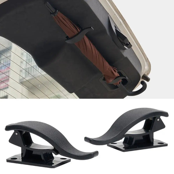 Two black car seat back organizer hooks are shown, featuring brown leather straps and mounting plates.