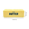 Rechteckiger Block gesalzener Butter mit der Aufschrift BUTTER