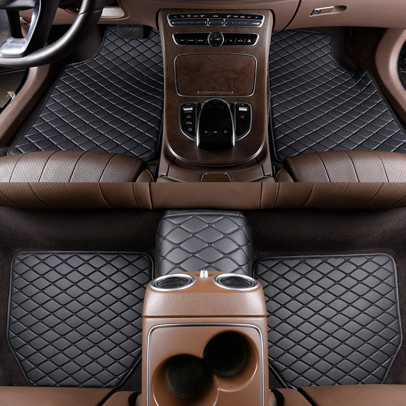 Interior view of a car with brown leather floor mats and wood trim visible on the dashboard and seats.