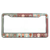 A rectangular aluminum license plate frame with a decorative border featuring various paw prints in earthy tones.