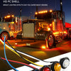 A close-up view of round LED side marker lights installed on a truck, showing various colors and wiring.
