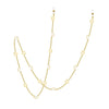 Gold chain necklace featuring a star and moon pendant design