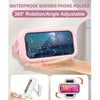 Pink waterproof shower phone holder demonstrating 360 degree rotation and angle adjustment on a hand.
