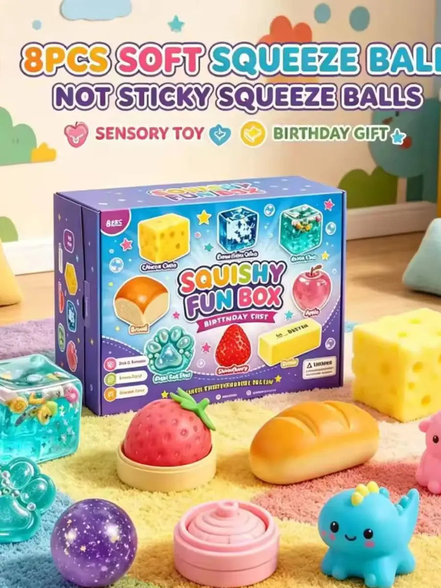 Eine Box mit 8 weichen, quetschbaren Bällen in verschiedenen Farben und Formen, darunter Gelb, Pink und Blau, präsentiert auf