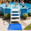 A white ladder and blue step-in platform are placed in a large blue inflatable foot soaking basin filled with water.
