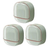 A pair of modern, light green waterproof hanging soap holders with drainage features.
