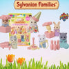 Sylvanian Families mini kitchen playset featuring a pink and purple animal family with food accessories