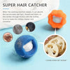 An orange super hair catcher laundry ball is shown next to various lint and hair fibers.