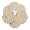 A set of six round, woven placemats in a natural beige color.