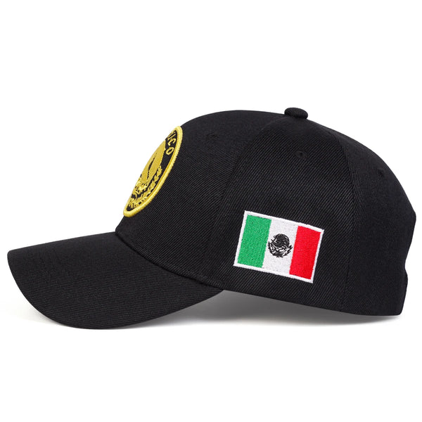 Black baseball cap embroidered with a gold emblem and a Mexican flag patch