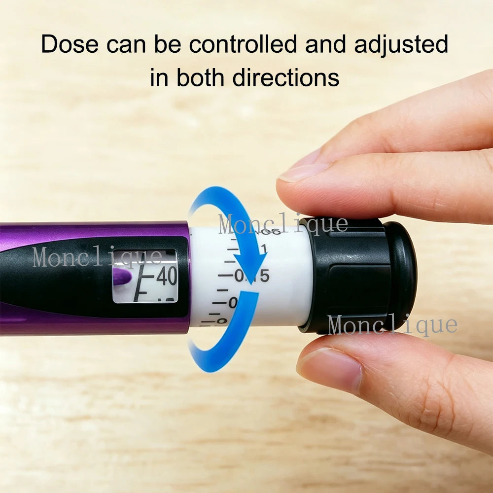 A hand holds a purple and black reusable metal injection pen with a dosage scale visible.
