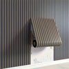 A modern, vertical, ribbed metal wall tile fixture mounted on a dark gray wood-grain panel.
