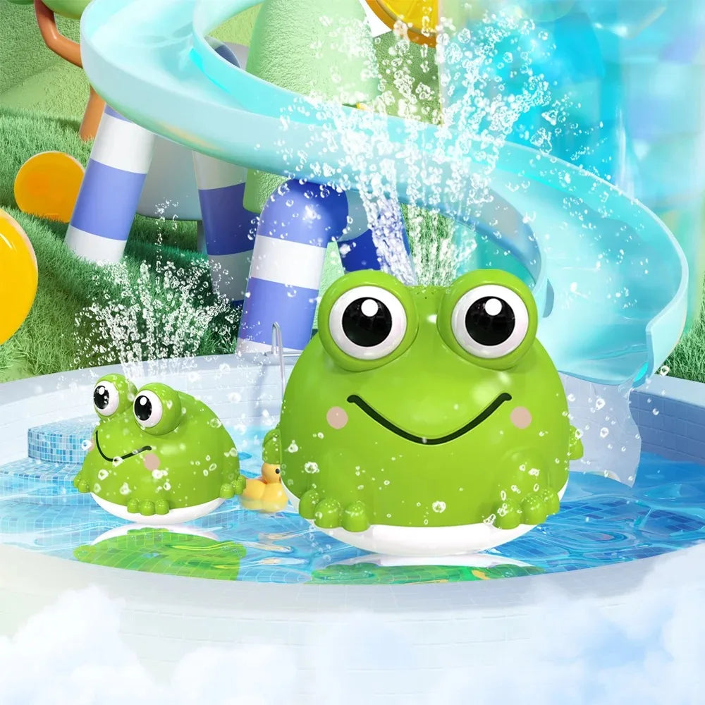 A bright green frog toy is spraying water in a blue bath with a large, curved plastic slide visible in the background.