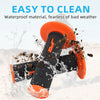 Orange and black aluminum motorcycle handlebar grips with rubber coating shown in action against water spray.