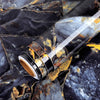 Roll of waterproof self-adhesive marble wallpaper featuring dark gray and gold veining
