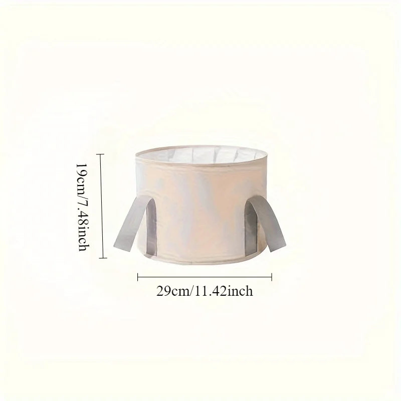 A light beige folding foot soak tub with a removable lid and insulating handles.