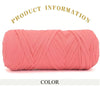A skein of thick pink polyester blend yarn coiled for knitting and crochet projects.