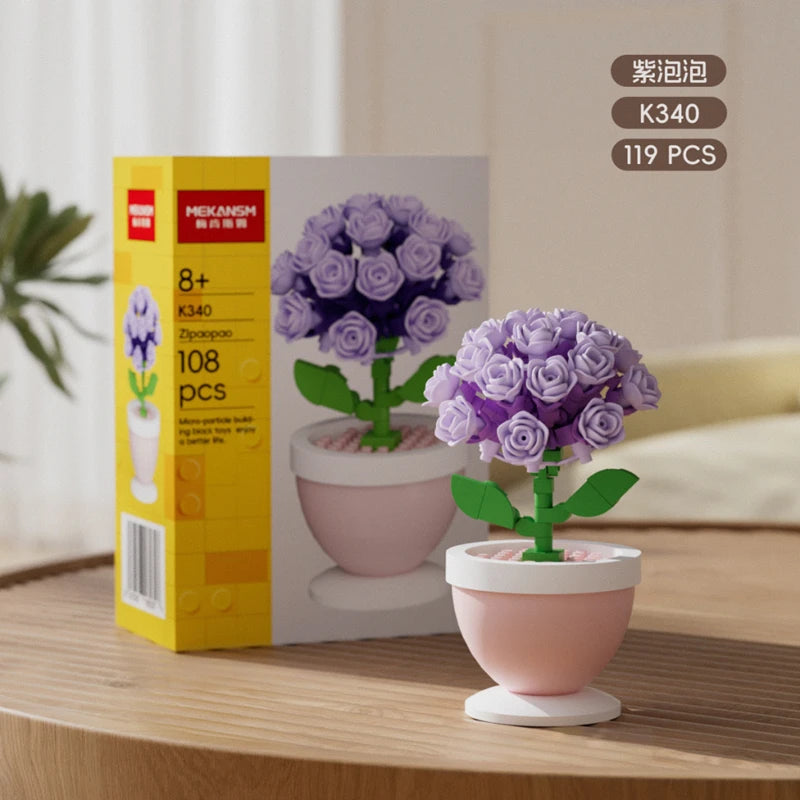 A box of K340 flower pot building blocks set containing 119 pieces of purple roses and other flowers.