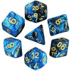 A collection of seven polyhedral dice in various shades of blue and black.