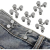 Set of four adjustable silver buttons used to tighten jeans waistlines